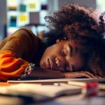 woman-asleep-office-desk_1030879-10382